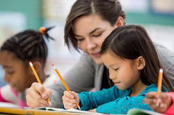Woman Tutoring Child
